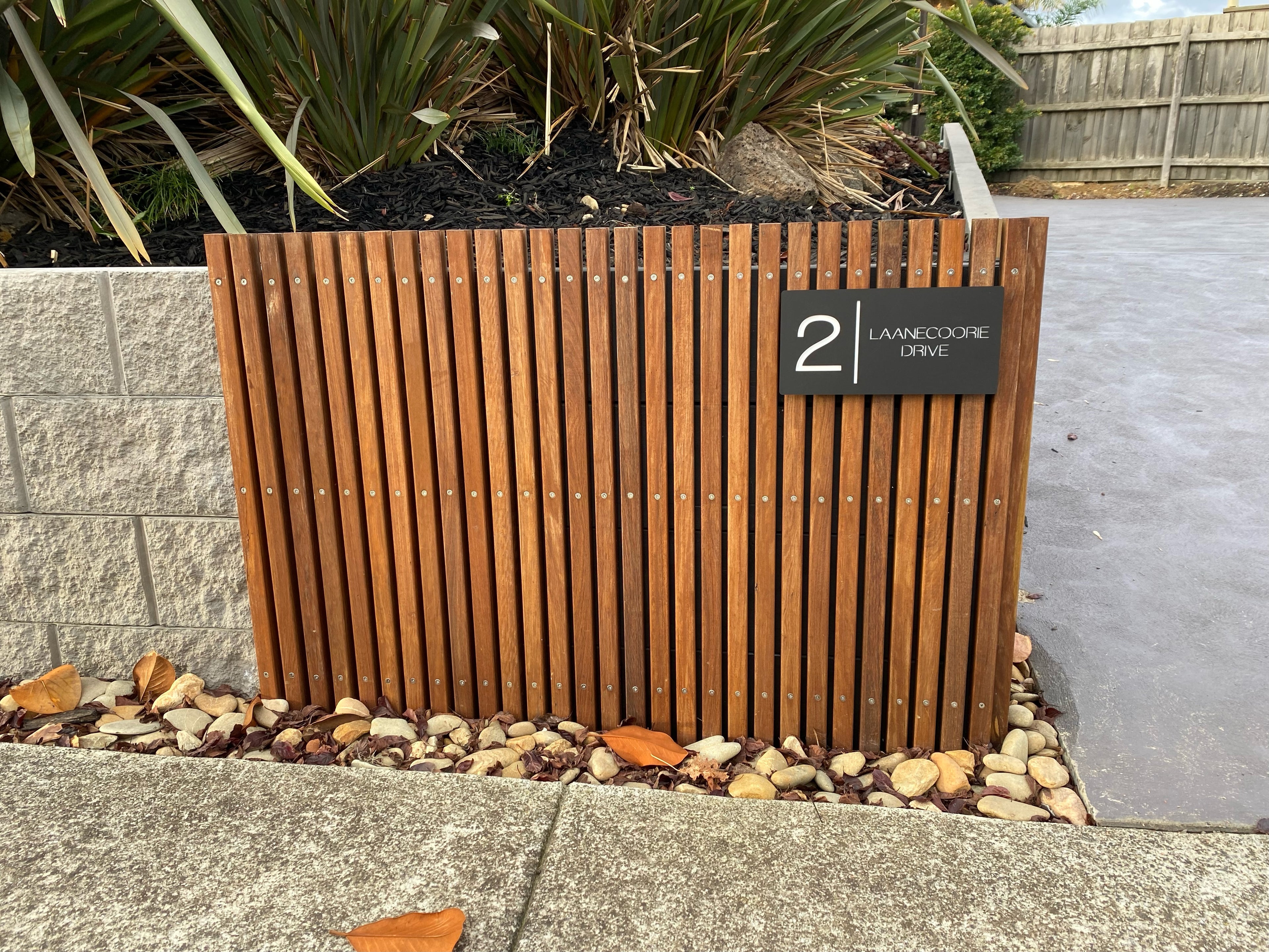Laser Cut House Sign Number Installed onto Fence Wall
