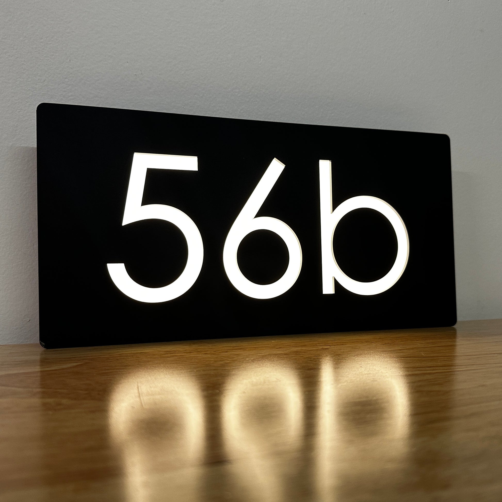 Illuminated LED Light Up House Sign. Made In Australia. Light Up Numbers on Black background 
